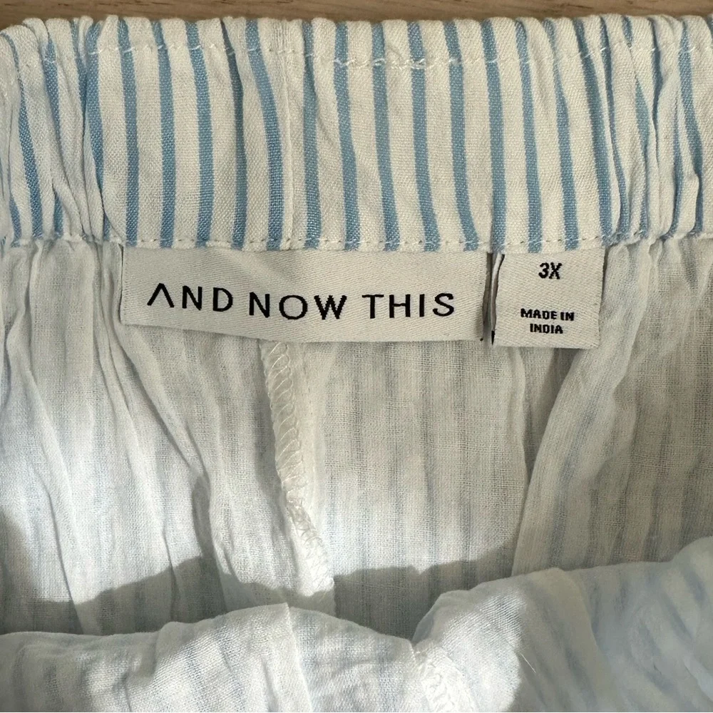 And now this Seersucker blue and white stripe ruffle trim shorts - Picture 2 of 6